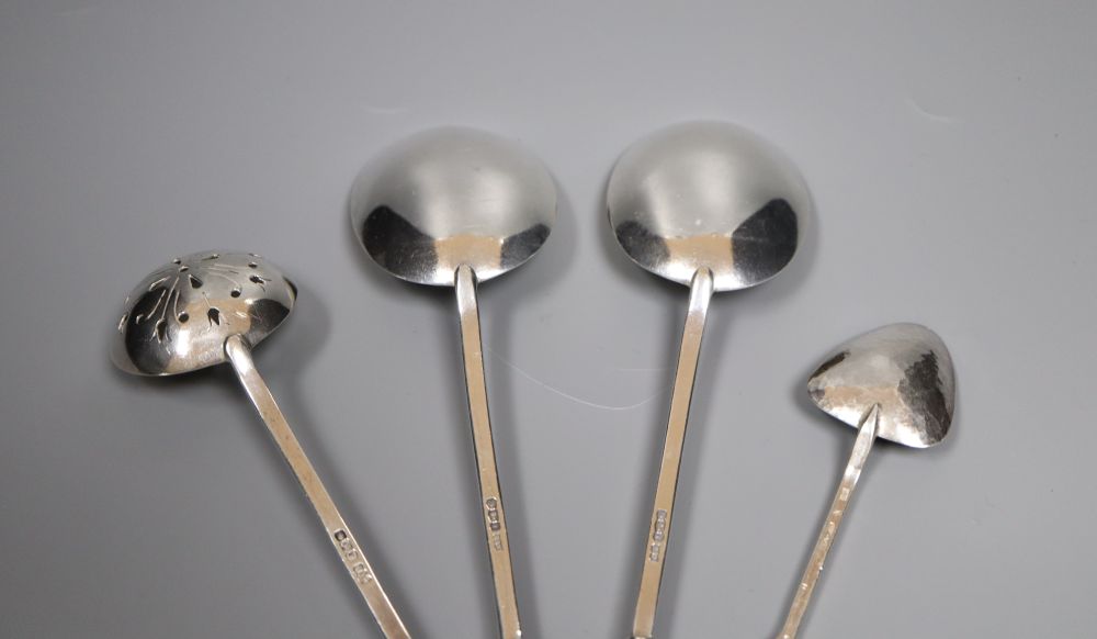 A pair of George V silver seal top serving spoons by Mappin & Webb, a silver sifter spoon, pair of silver tongs etc.
